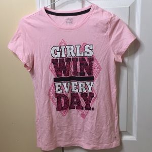 Α pink t-shirt with matching pink leggings